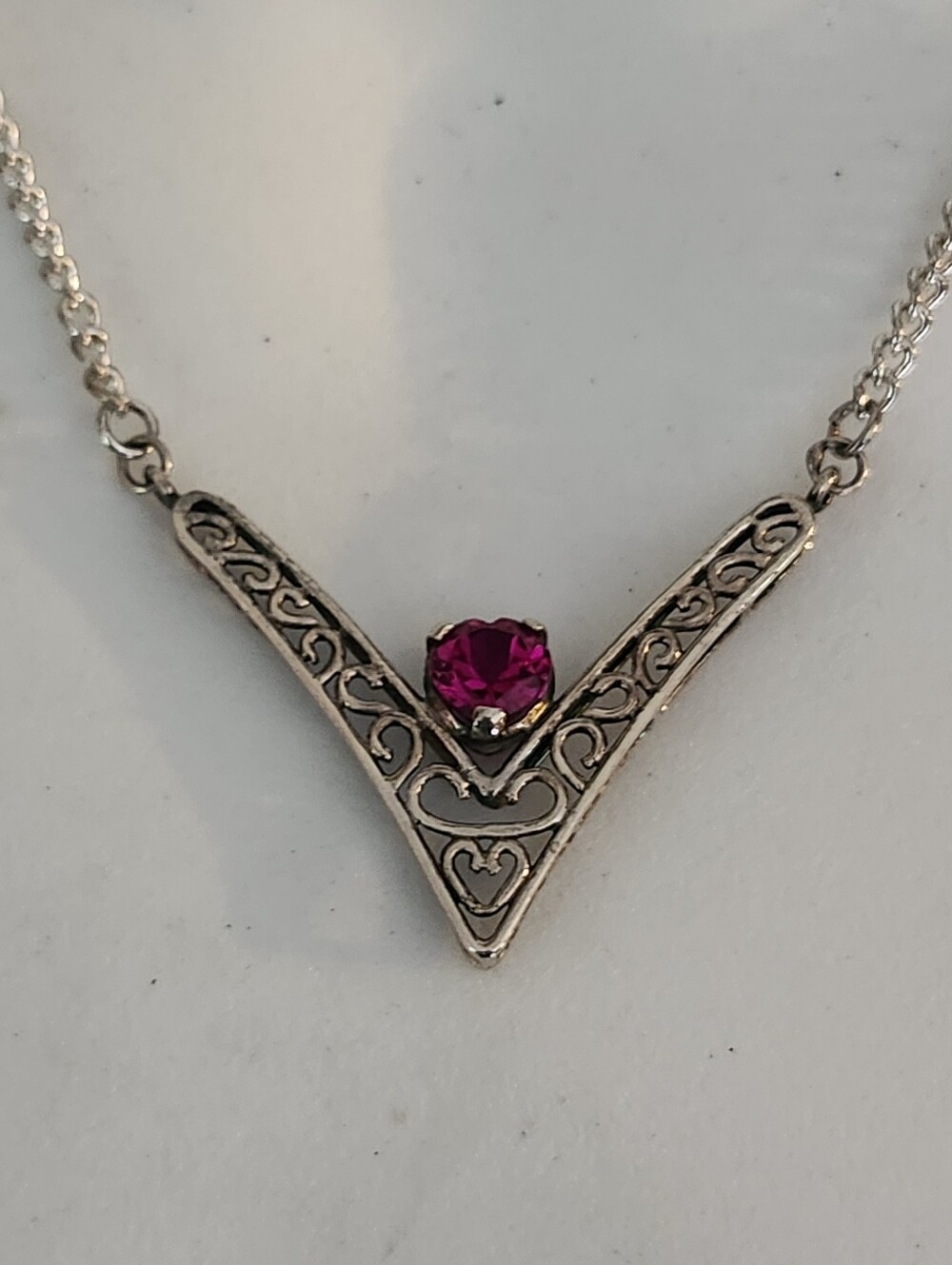 Silver Filigree V-Shaped Necklace with Pink Gem